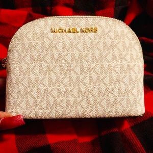 Authentic MK Lg Hand held Travel Pouch